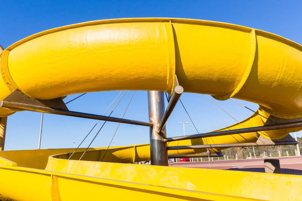 Swimming,Pool,Yellow,Water,Slide,Structure,Closeup,Family,Holiday,Destination.